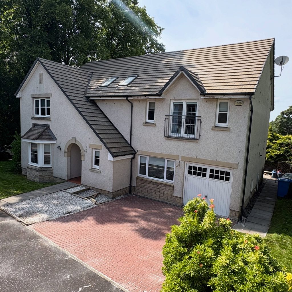 Complete roof cleaning and biocide treatment