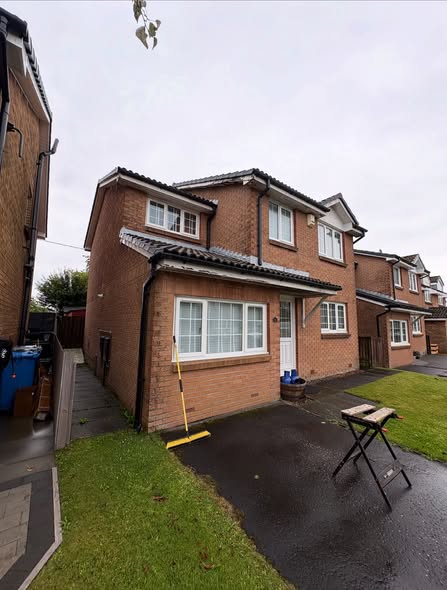 Roof moss scraping and gutter clearing